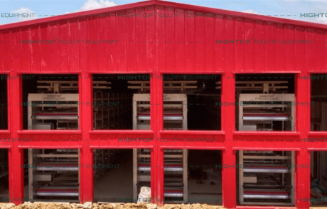 Automatic manure cleaning machine seen from outside the chicken house